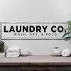 Laundry Co. Metal Wall Plaque