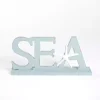 Blue Sea Wooden Word Statue