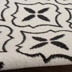 Ivory & Black Quatrefoil Indoor/Outdoor Rug, 8x10