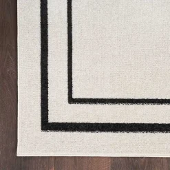 Ivory Bordered Indoor/Outdoor Area Rug, 5x7