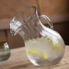 Tilted Ribbed Glass Pitcher